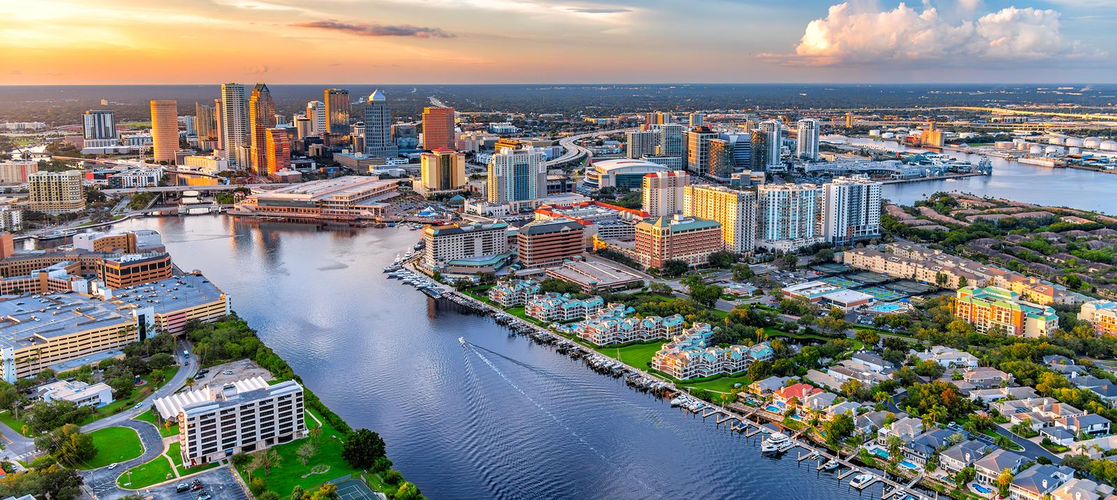 Vibrant cityscape with waterway and buildings